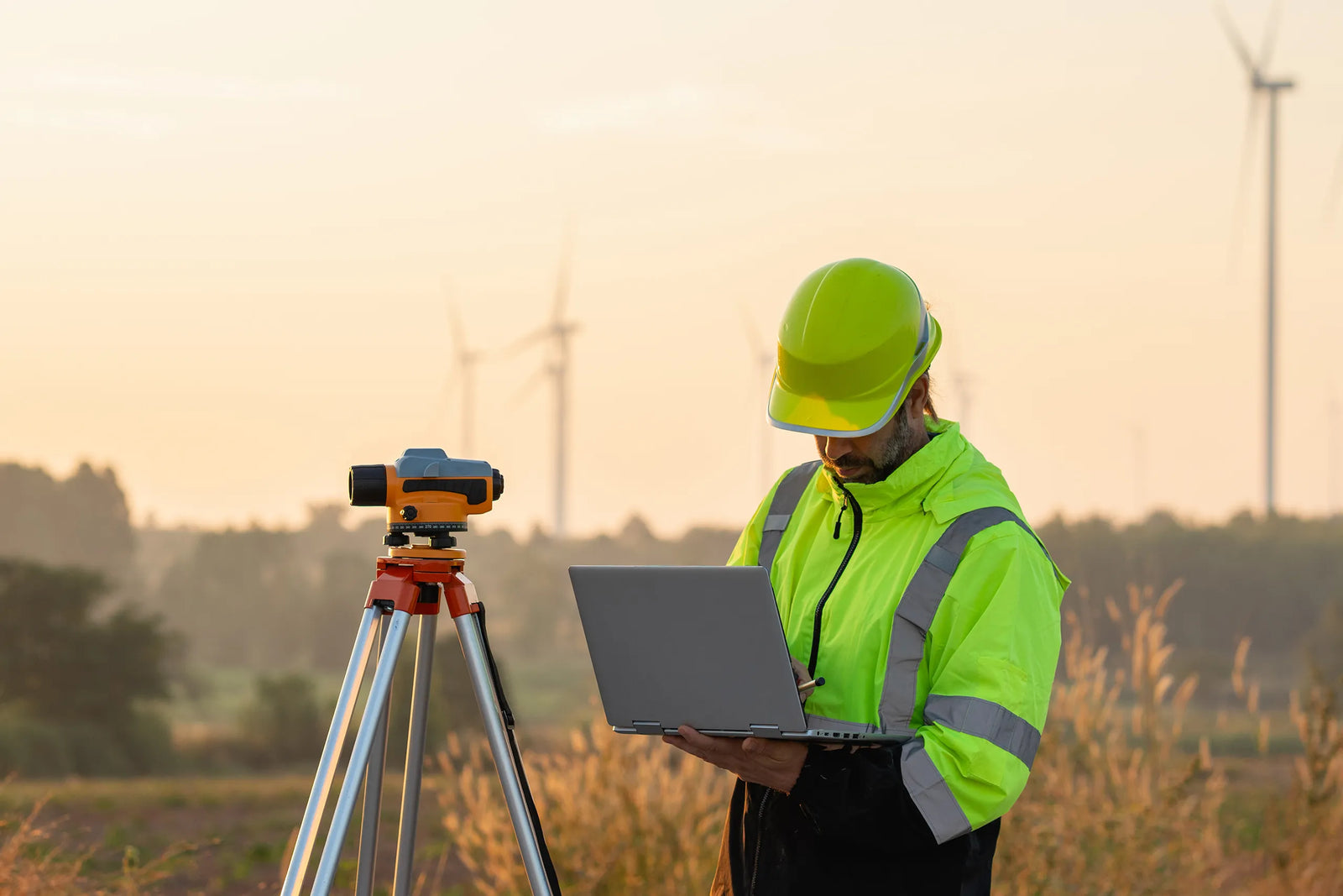 Construction worker surveying specialist